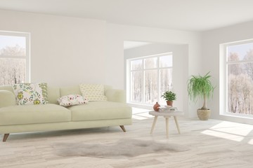 Stylish room in white color with sofa and winter landscape in window. Scandinavian interior design. 3D illustration