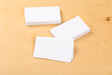 Photo of blank business cards on a general background. Template for identifier. View from above. mock up
