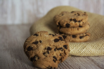 Set of chocolate chip cookies, on a linen napkin. Closeup and depth of field
