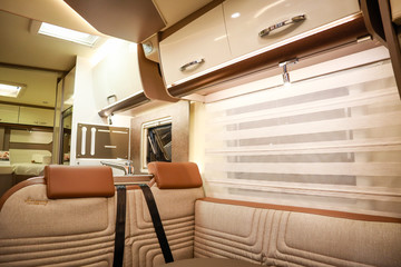 Fototapeta premium Interior of luxury caravan. Detail photo of coach with equipment