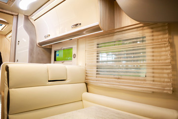 Interior of luxury caravan. Detail photo of coach with equipment.Kitchen