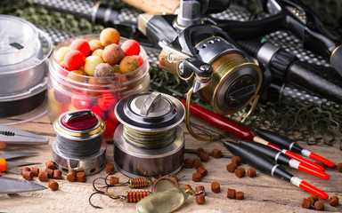 Spinning and fishing rods on an old background