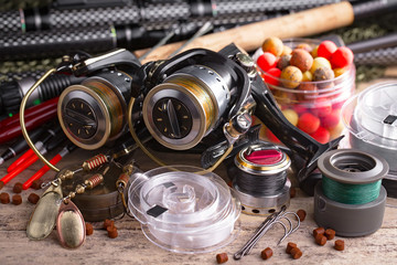 Spinning and fishing rods on an old background