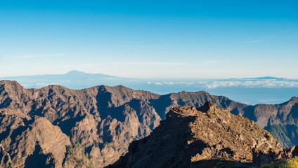 Fototapeta na wymiar Landscape in the volcanic crater Caldera de Taburiente Natoional Park seen from mountain peak of Roque de los Muchachos Viewpoint, island La Palma, Canary Islands, Spain