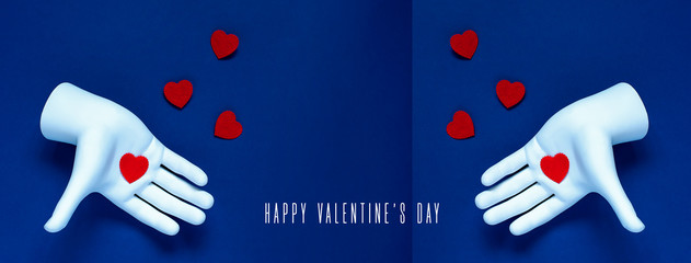 Two hands throw red hearts on a blue background. Book reversal. The concept for Valentine's Day