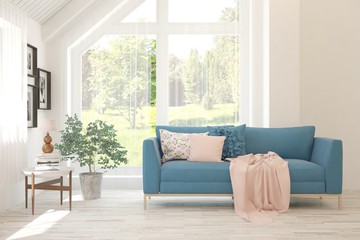 Stylish room in white color with sofa and summer landscape in window. Scandinavian interior design. 3D illustration