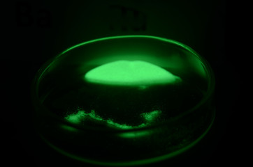 Sample of a compound with the element No 88. Radium, It s radioactive and emits a greenish light