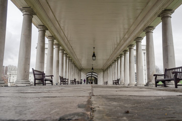 Landscape of lines formed by architectural columns inside a corridor