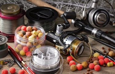 Spinning and fishing rods on an old background