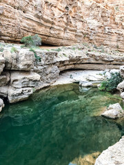 rocks in the water of wadi