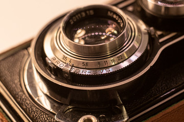 Fototapeta na wymiar Close up on old vintage analogue photo camera on film 