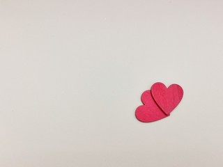 Two red origami hearts on white background. Valentin's Day gift cards. Top view.
