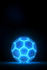Naklejka premium Glowing soccer ball in the dark