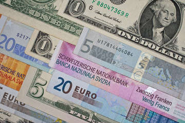 Fototapeta na wymiar Various Euro, US dollar and Swiss franc banknotes