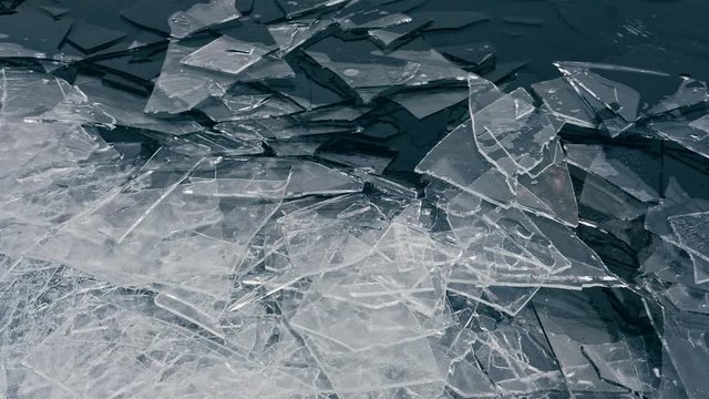 Ice drift on the river. Chunks of ice collide with each other.
