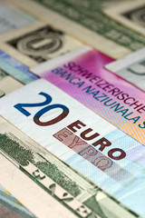 Various Euro, US dollar and Swiss franc banknotes