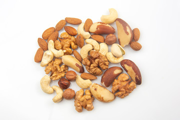different nuts on a white background. protein and healthy food