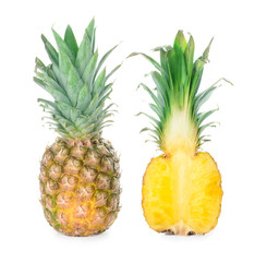 Fresh ripe pineapples on white background