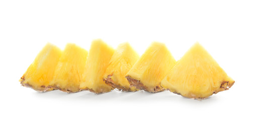 Fresh ripe pineapple slices on white background