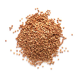 Heap of raw buckwheat on white background