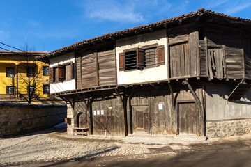 Fototapeta na wymiar Street and old houses in historical town of Koprivshtitsa, Bulgaria