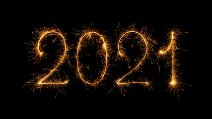 Happy New Year 2021 written with bengal fire, sparkler fireworks candle isolated on a black background. New Year dark background.