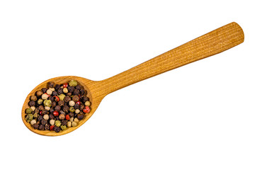 Wooden spoon with different spices isolated on a white background