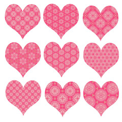Fototapeta na wymiar Set of romantic heart shapes in light red coral pink and white isolated on white. Symbols of love for Valentines Day. Can be cut-out separately. 
