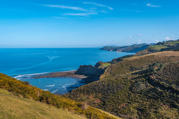 Naklejka premium Vista towards Zumaia walking along the coast from Deba to Zumaia. Basque Country