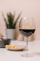 Glass of red wine on the kitchen table
