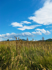 September landscape with beautiful cloudy sky and the Bulgarian Fore-Balkan mountain hills