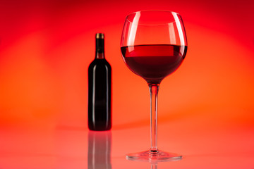 Wine glass with red background