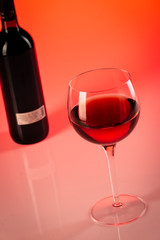 Wine glass with red background