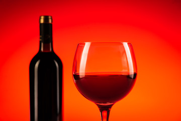 Wine glass with red background
