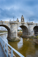 Fototapeta premium Views of the Toledo Bridge, located in the park of Madrid River over the Manzanares River, baroque style, architectural concept