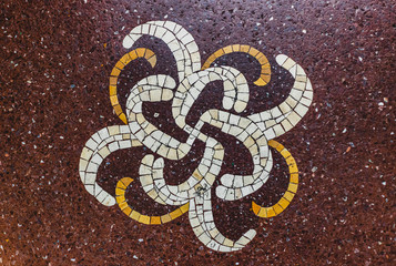 Fragment of an ancient floor floral mosaic, mosaic tiled floor