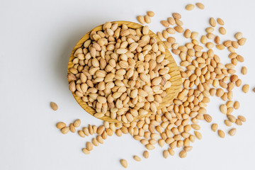 Mahlab seeds on white background. Aromatic spice made from the seeds of a species of cherry, used in small quantities to sharpen sweet foods. Used in Greek, Turkish, Middle East cuisine.