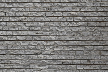 
Brick wall, old red stone blocks texture. Background.