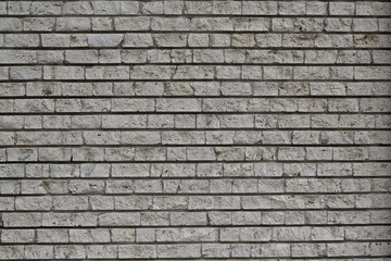 
Brick wall, old red stone blocks texture. Background.