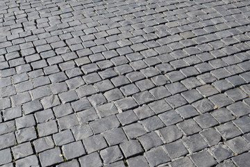 A typical Italian pavement: Sampietrini (or Sanpietrini). Black and white.