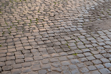 A typical Italian pavement: Sampietrini (or Sanpietrini). Black and white.