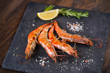 Barbeque grilled prawns. Shrimp seafood with lemon and spices. Fish restaurant menu