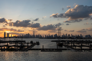 Fototapeta premium Silhouette of Dubai Skyscrapers during sunset