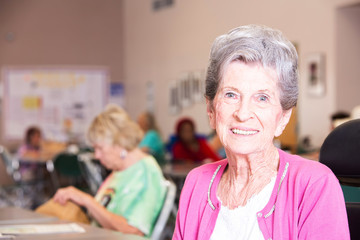 Horizontal Shot of Smiling Woman in a Senior Center