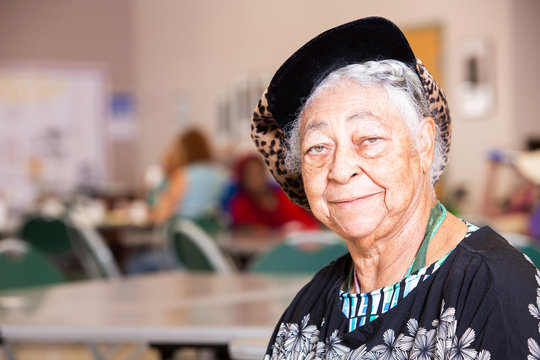 Horizontal Shot of Smiling African American Woman in a Senior Center