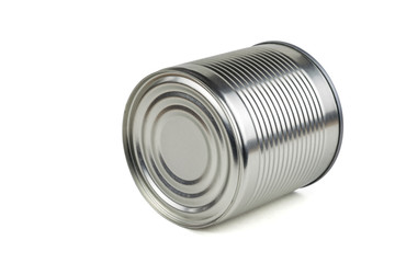 A tin can lying on its side isolated on a white background.