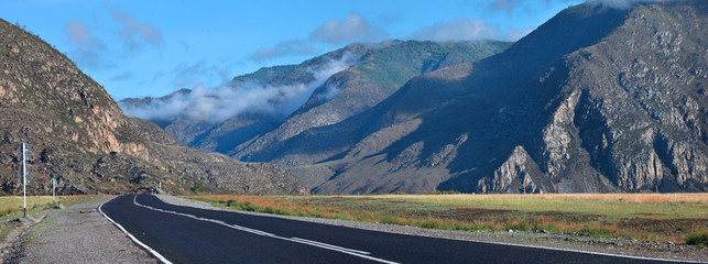 Chuiski tract, road in the mountains of Altai. Panoramic view. Travel and vacation in the mountains. © Valerii