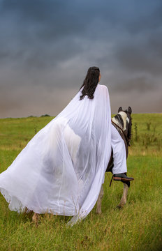 girl on horse in dress