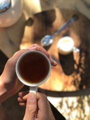 Fototapeta na wymiar a cup of tea on wooden table.