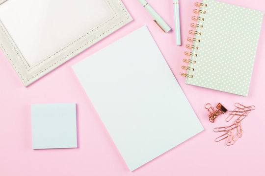 flat lay stationery collocate on work desk in pastel colorful background	